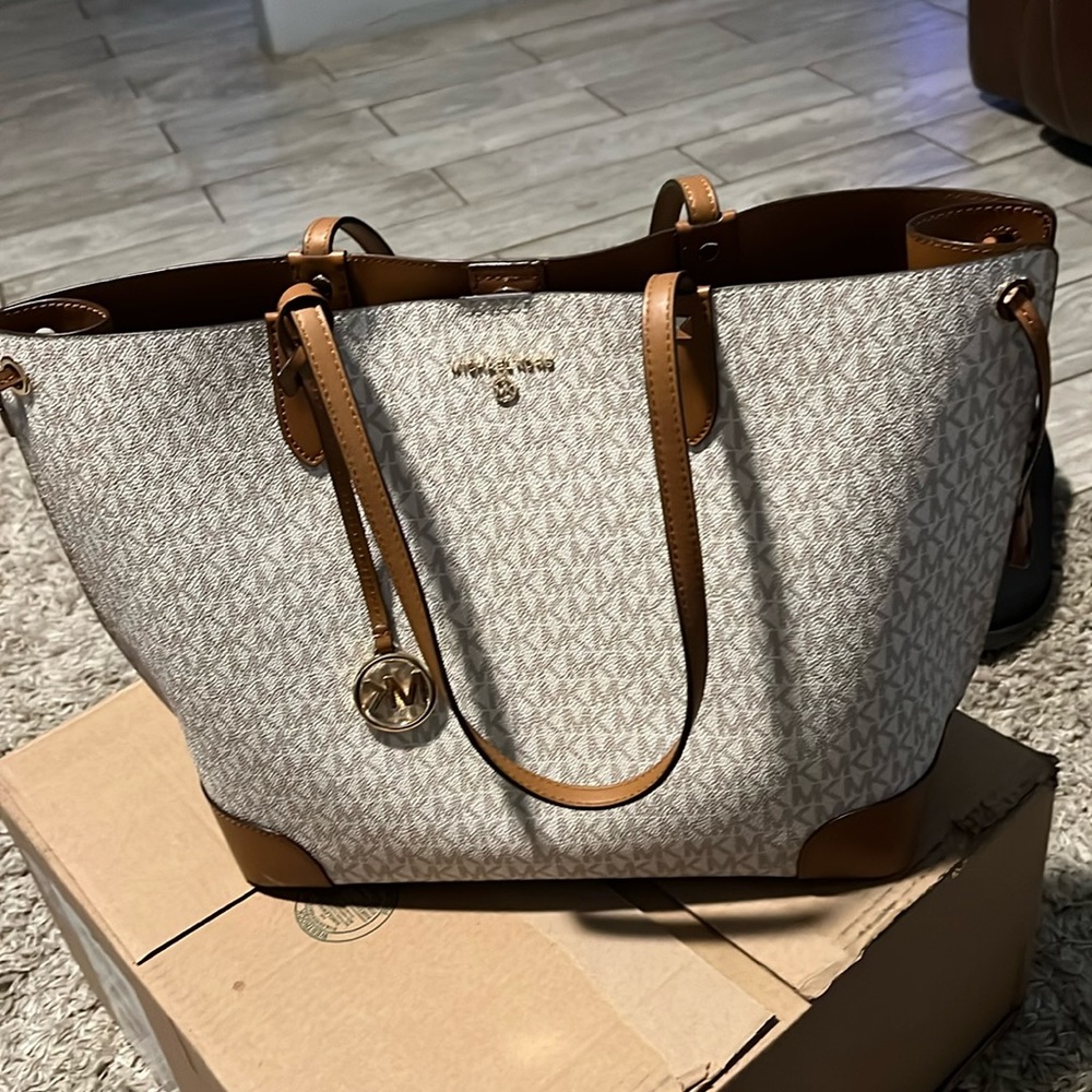 Michael Lora huge bag very nice paid 250 on sale..went back to smaller bags..